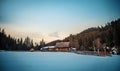 Wooden cottage with blue starry sky in evening Royalty Free Stock Photo