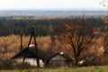 Wooden cottage house at autmn