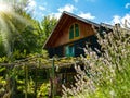 wooden cottage house traditional natural in the forest with garden Royalty Free Stock Photo