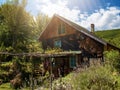 wooden cottage house traditional natural in the forest with garden Royalty Free Stock Photo