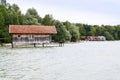 Wooden cottage on pier on the lake Ammersee in Inning am Ammersee, Germany