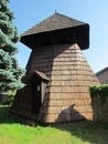 Wooden country bell tower, thatched structure, historical cultural heritage