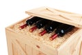 Wooden crate with bottles of wine isolated on white,