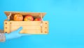 Wooden crate box full of fresh apples isolated on a red background Royalty Free Stock Photo