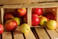 Wooden crate box full of fresh apples