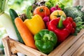 Wooden crate filled with fresh organic vegetables Royalty Free Stock Photo