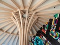 A wooden, creative, artistic roof on a terrace