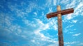 Wooden cross against blue sky. Concept of hope, Easter celebration, resurrection, divine presence, religious faith