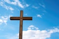 a wooden cross against a blue sky Royalty Free Stock Photo