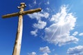 Wooden Cross Against a Blue Sky Royalty Free Stock Photo