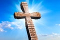 Wooden cross against sky background Royalty Free Stock Photo