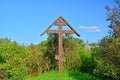 Wooden cross in ancient Voznesensky Orshin monastery in the summer in Tver region, Russia Royalty Free Stock Photo