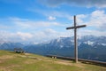 Wooden cross and bench at wank mountain summit Royalty Free Stock Photo