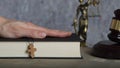 Wooden cross on a bible. Closeup Royalty Free Stock Photo