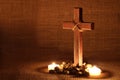 Wooden Cross By Candlelight With Shabby Background