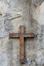 a wooden cross, on a concrete background.