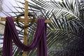 wooden cross, crown of thorns and purple fabric Royalty Free Stock Photo