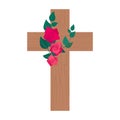 Wooden cross decorated with a bouquet of red roses Royalty Free Stock Photo