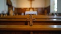 Wooden Cross on Empty Pew for Ash Wednesday. Ash cross on an empty pew, symbolizing Ash Wednesday, simple wooden church