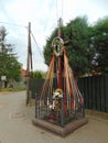 Wooden Cross with Flowers and Ribbons