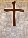 Wooden cross hanging on the brick wall in the christian church forbelief worship and pray ,concept of spiritual sign of savior ,