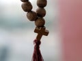 Wooden cross hanging on the windshield of the car Royalty Free Stock Photo