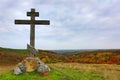 Wooden cross on hill