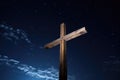 wooden cross lit against a starry night sky Royalty Free Stock Photo