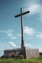 Wooden cross, roadside shrine, sky