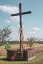 Wooden cross, roadside shrine, sky