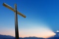 Christian cross over beautiful sunset background Royalty Free Stock Photo