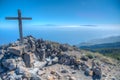 Wooden cross, Tenerife and La Gomera viewed from Pico de la Nieve at La Palma, Canary islands, Spain