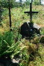 Wooden cross with tombstone on grave of soldier of Soviet army from Second World War near tourist pathway in Javorniky mountains, Royalty Free Stock Photo