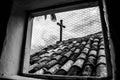 Wooden cross on top of an old church