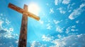 Wooden cross under blue sky. Concept of hope, Easter celebration, resurrection, divine presence, religious faith Royalty Free Stock Photo