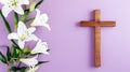 Wooden cross among white lilies on a soft purple background on a religious theme, copy space. Easter concept Royalty Free Stock Photo
