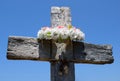 Wooden cross with wreath