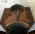 Wooden crucifix on a brick wall. Royalty Free Stock Photo
