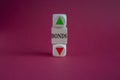 A wooden cube with arrow symbolizing that BONDS price are going down or up. Beautiful red background. For Bonds yield return of