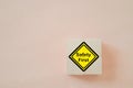 Wooden cube block with safety first icon for work safety, caution work hazards, danger surveillance campaign, zero accident