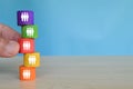 Wooden cube blocks with people icons. Searching for talent and looking for employee concept Royalty Free Stock Photo