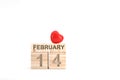 Wooden cube calendar with 14th february date and red heart, Valentime`s day concept Royalty Free Stock Photo