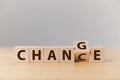 Wooden cube flip with word `change` to `chance`, Personal development and career growth or change yourself