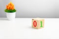 A wooden cube on a white table with text TRUE, FALSE. Concept of development and coding, programmer software, app, prototype, Royalty Free Stock Photo