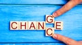 Wooden cube with word `change` to `chance` on wood table. Personal development and career growth or change yourself concept. conce Royalty Free Stock Photo