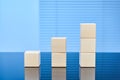 Wooden cubes on a blue background