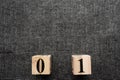 Wooden cubes with dates on a black background. Subject layout. Items on a black background