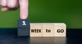 Wooden cubes form the expression '1 week to go'. Royalty Free Stock Photo
