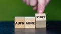 Wooden cubes form the German expression 'Aufnahme stopp' (migration stop). Royalty Free Stock Photo