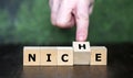 Wooden cubes form the words nice and niche. Symbol for finding a nice niche. Royalty Free Stock Photo